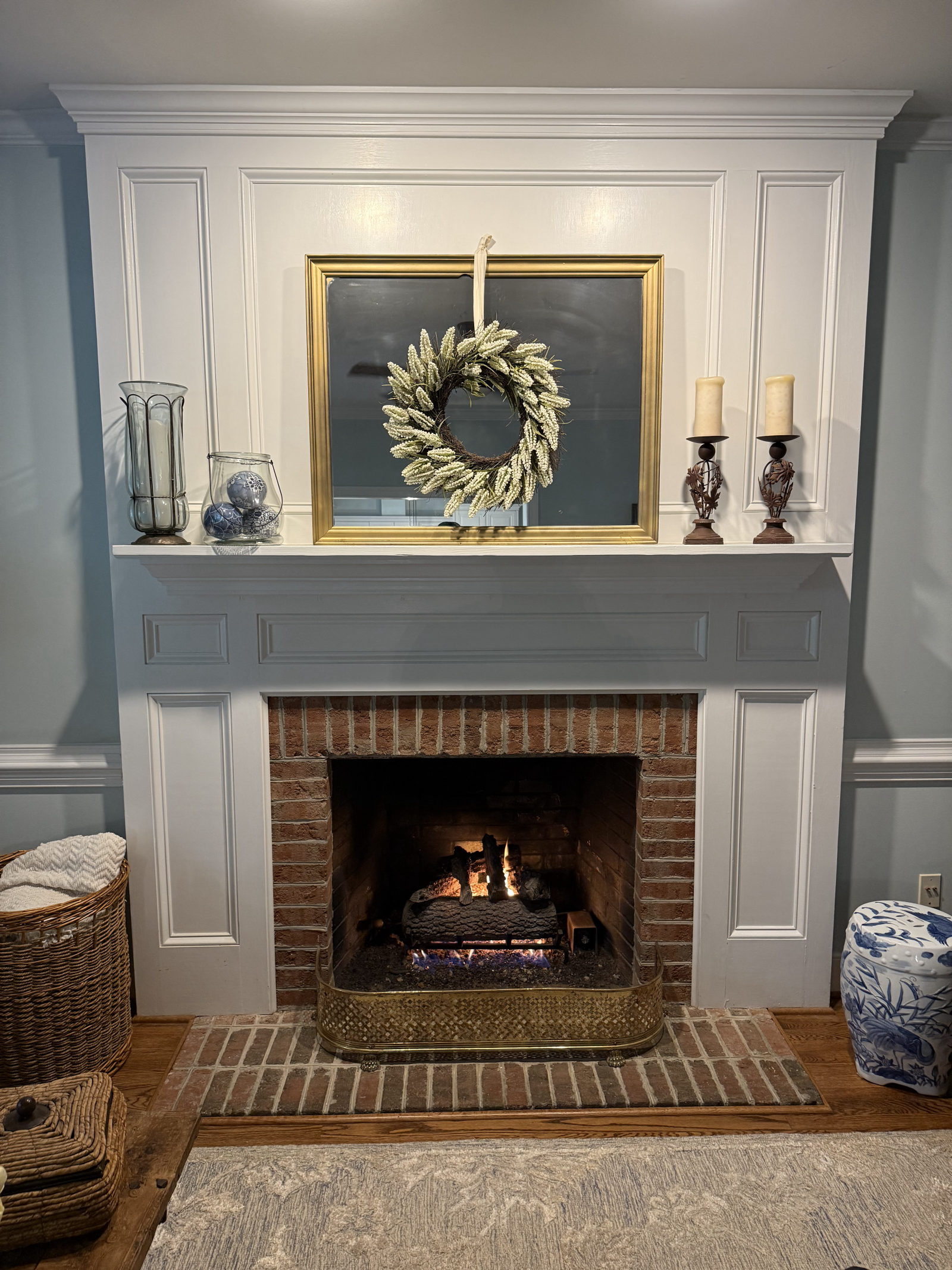 Grand Canyon gas log set inspection and cleaning — brick hearth with white mantel in Cary, NC