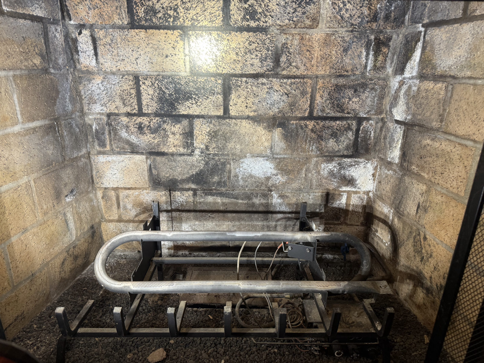 Gas log set replacement — older set removed, new 24" Hargrove electronic ignition installed in Fuquay-Varina, NC