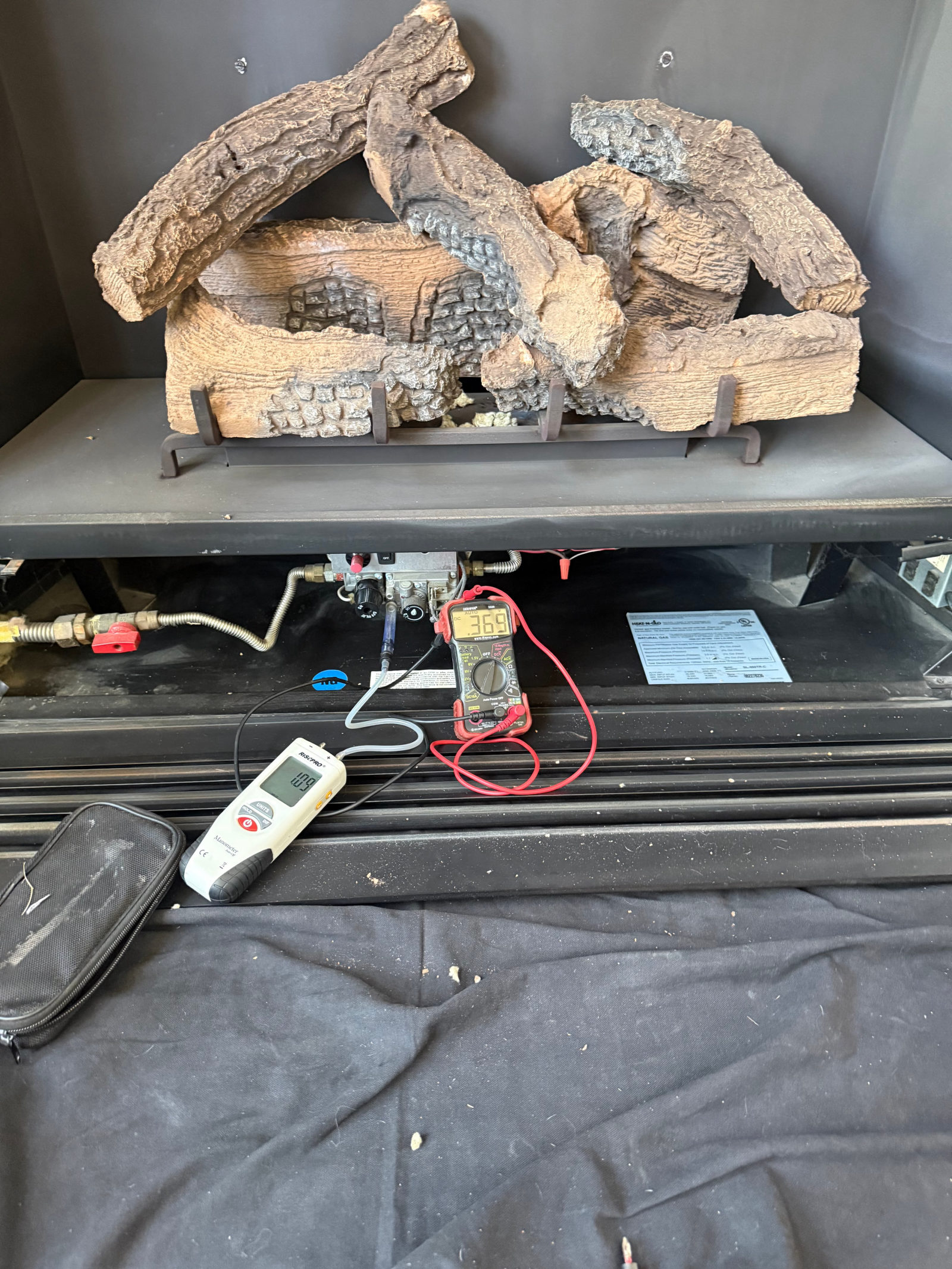Gas log diagnostics — thermopile voltage test on a Heat-N-Glo direct vent fireplace